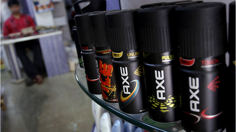 Cans of Axe body spray, made by Hindustan Unilever Ltd., sit
