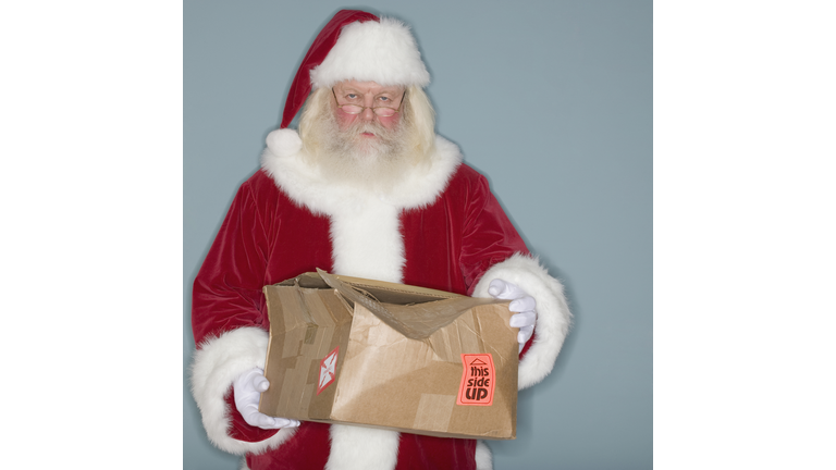 Santa Claus holding damaged box