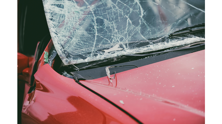 Close-Up Of Broken Red Car