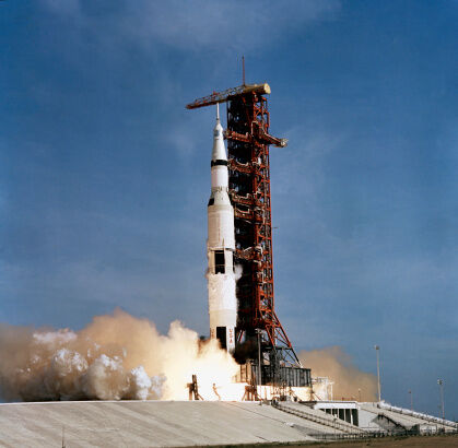 Apollo 11 space vehicle taking off from Kennedy Space Center.