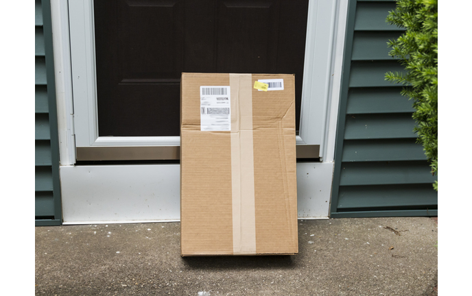 Cardboard package left at front door
