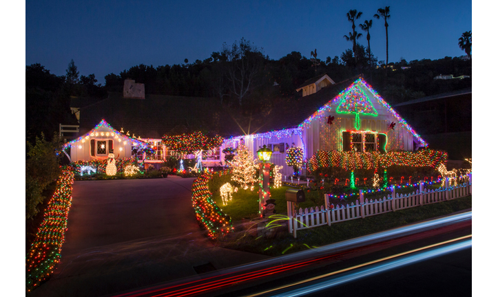 House with abundant exterior Christmas lights