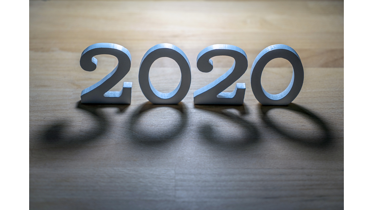 New year 2019 change to 2020 concept, hand change wooden cubes