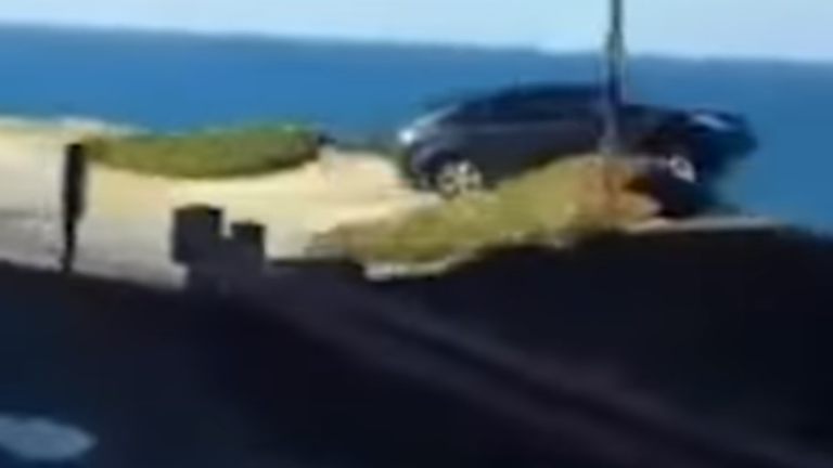 car seen plummeting over cliff 