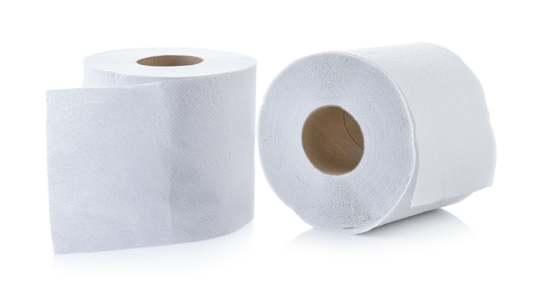 Close-Up Of Tissue Paper Rolls Over White Background