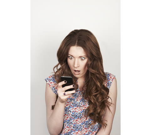 Portrait of woman using phone