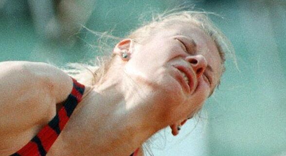 Russia's Anna Biryukova grimaces in pain