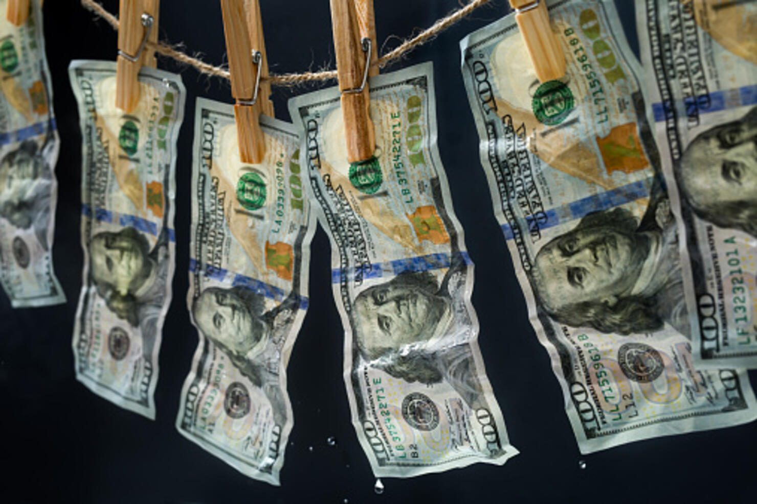 Laundered dollars hanging on a rope