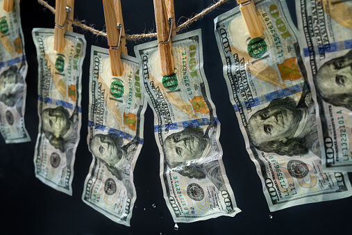 Laundered dollars hanging on a rope