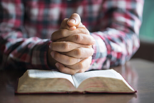 A man reading the Holy Bible.