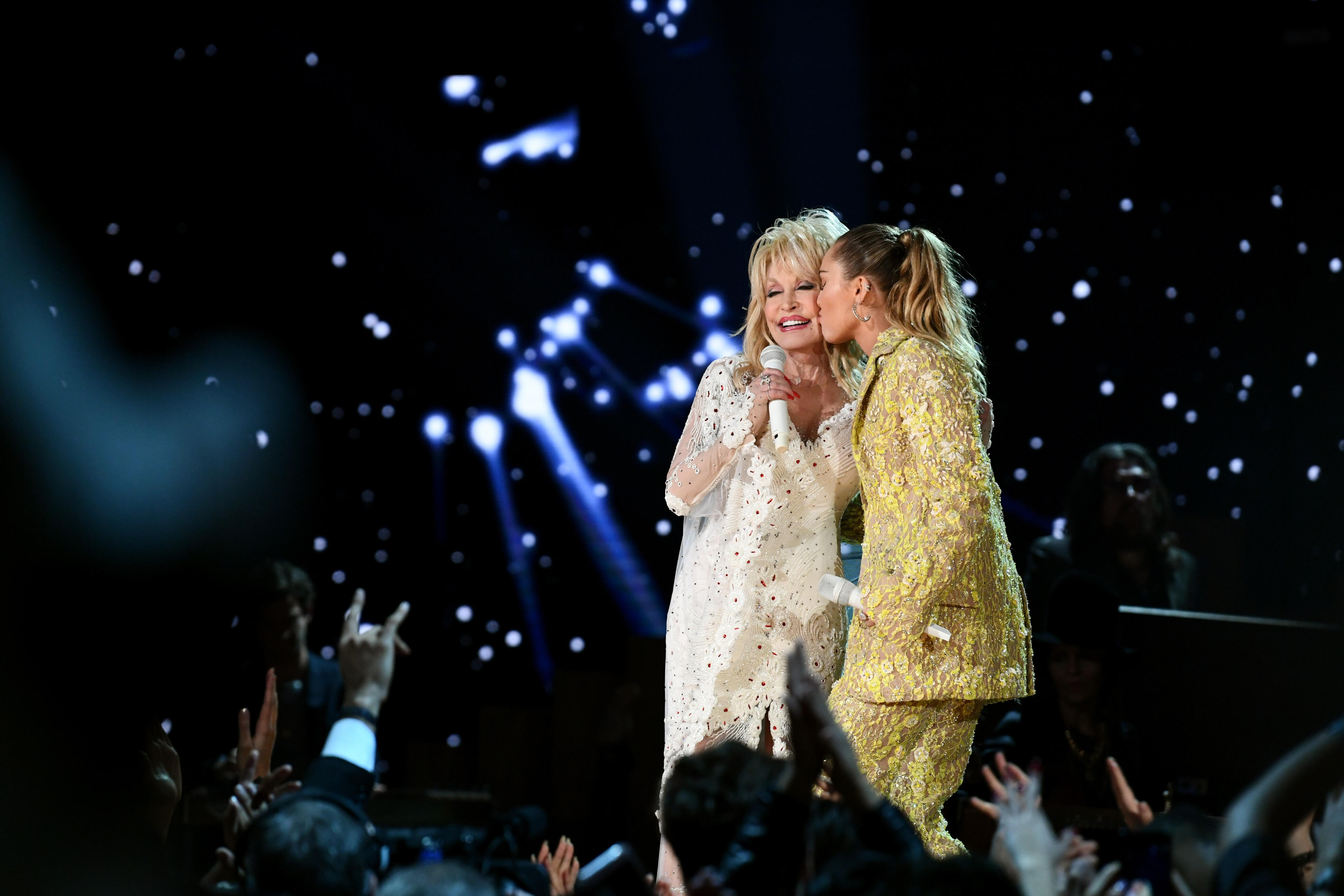 Miley Cyrus Pays Tribute To Godmother Dolly Parton With Fun Backstage Clip Iheart