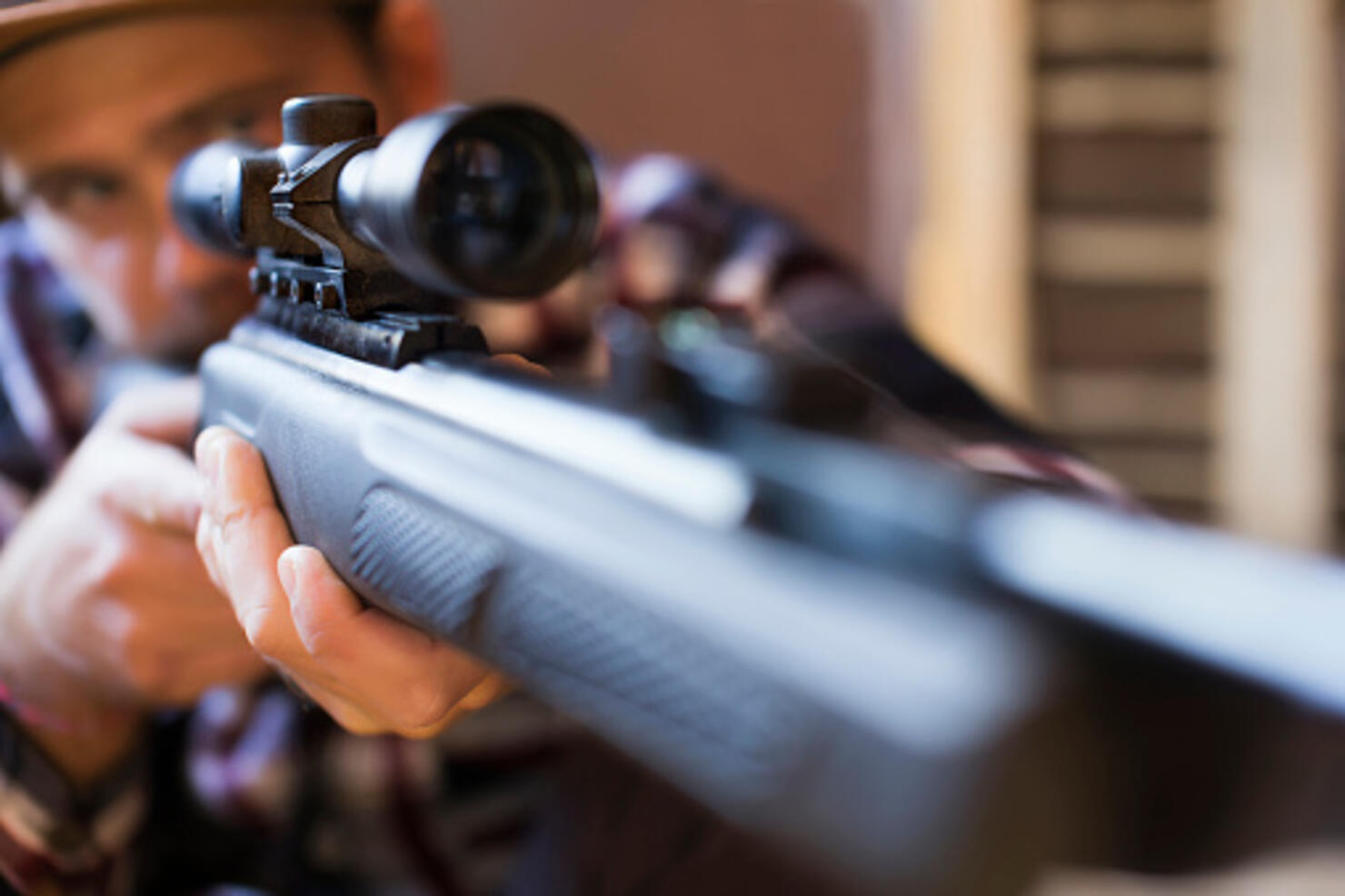 Man aiming with rifle