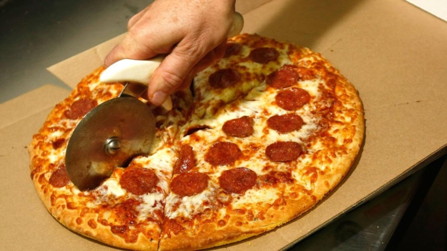 Little Caesars' New Pizza Is Actually Half Pizza And Half Cheese Sticks