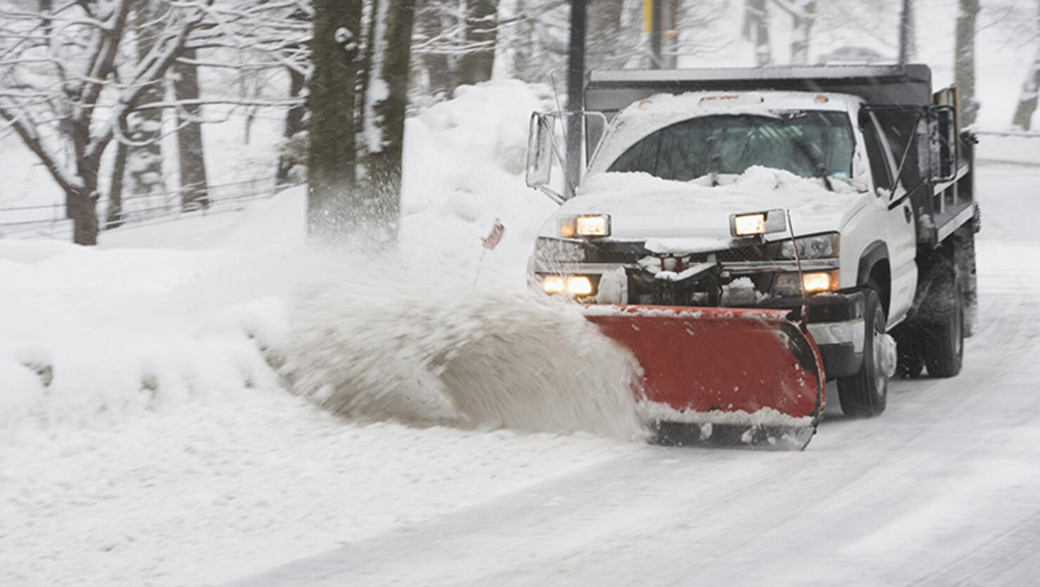 USA, New York City, snowplowing truck
