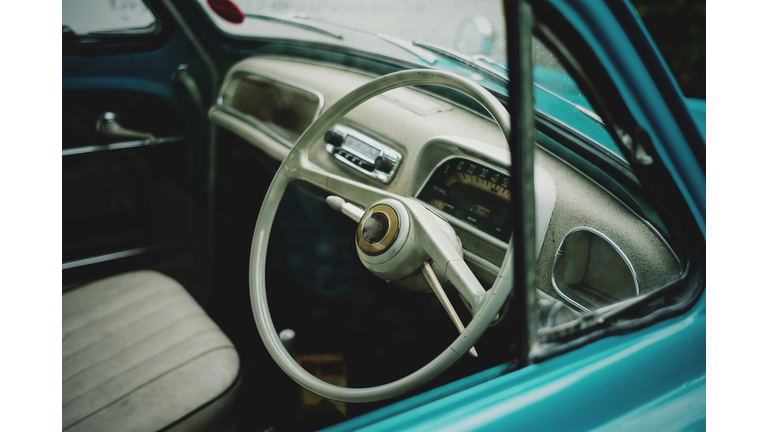 White steering wheel in vintage car