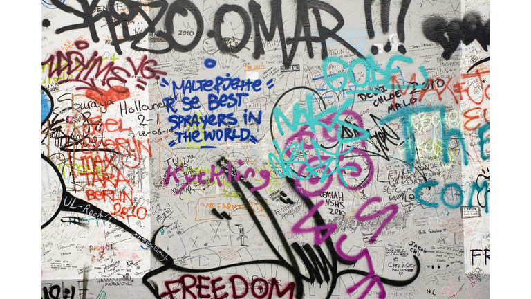 Graffiti covering a section of the Berlin Wall, Berlin, Germany