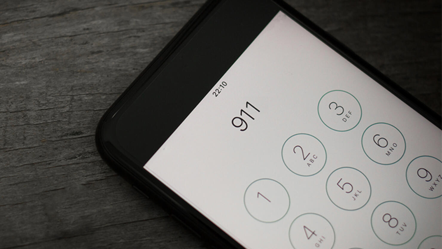 Emergency and urgency, 911 dialed on smartphone screen. Shallow depth of field.