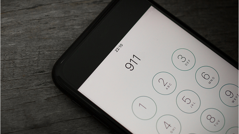 Emergency and urgency, 911 dialed on smartphone screen. Shallow depth of field.