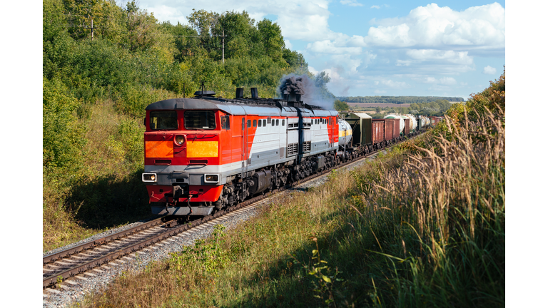Powerful diesel locomotive hauling a heavy freight train