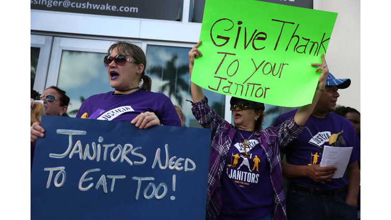 Janitors Tape Bananas To Themselves To Rally Against Low Wages