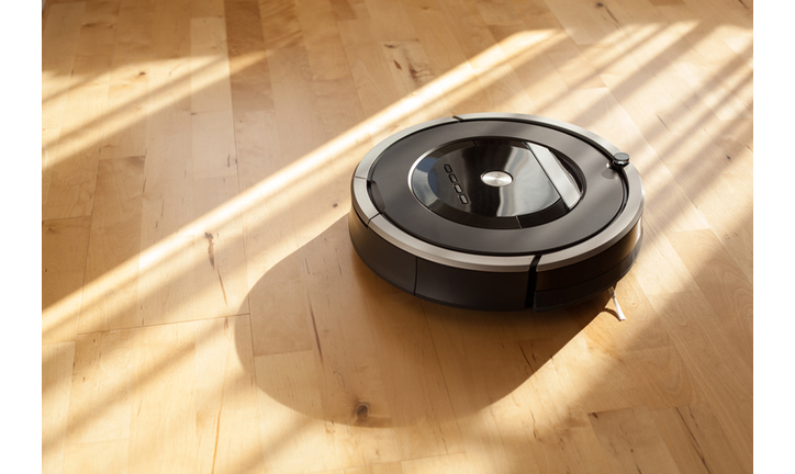 robotic vacuum cleaner on laminate wood floor smart cleaning technology