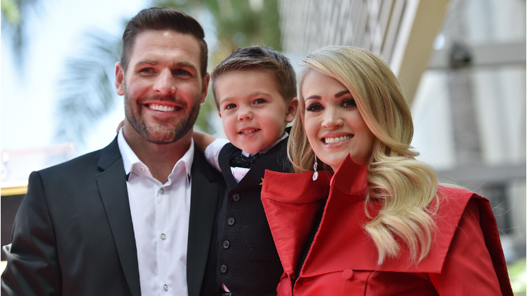 Carrie Underwood's Husband And Son Bundle Up For Skiing Adventure