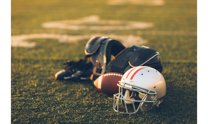 Silver Football Helmet on Field