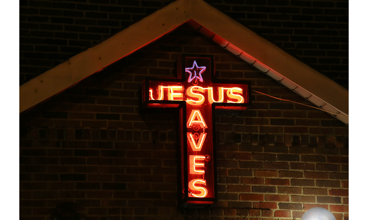 'Jesus Saves' Illuminated neon sign