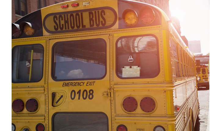 Rear view of yellow school buses, New York, USA