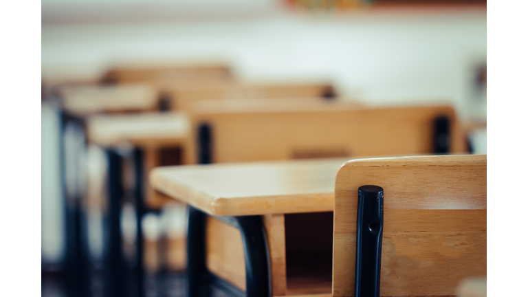 Back to school concept. School empty classroom, Lecture room with desks and chairs iron wood for studying lessons in highschool thailand without young student, interior of secondary education