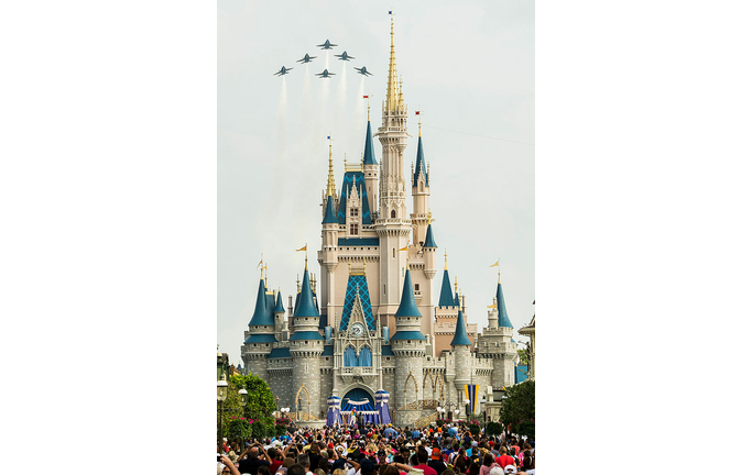 U.S. Navy Blue Angels Soar Above Cinderella Castle At Walt Disney World Resort