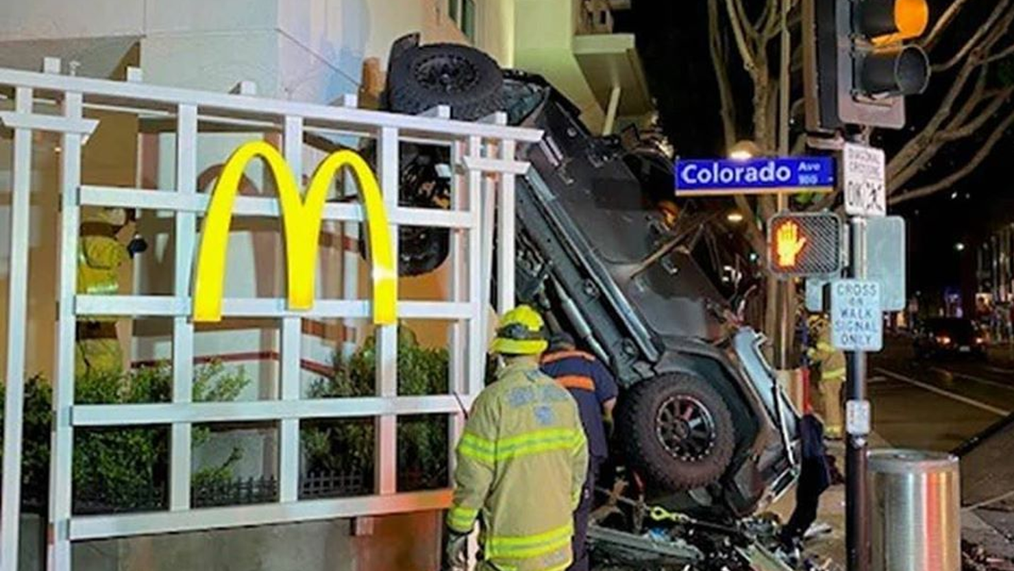 man lucky to be alive after driving off six-story parking garage