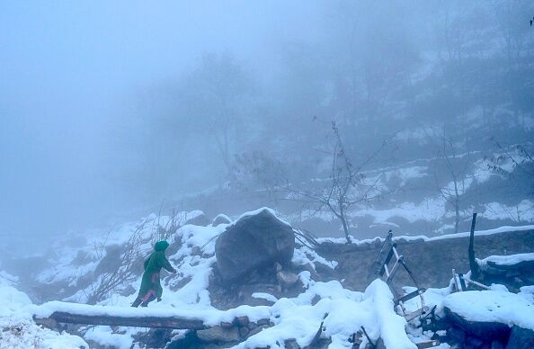 COURTESY OF GETTY: INDIA-KASHMIR-WEATHER-COLD