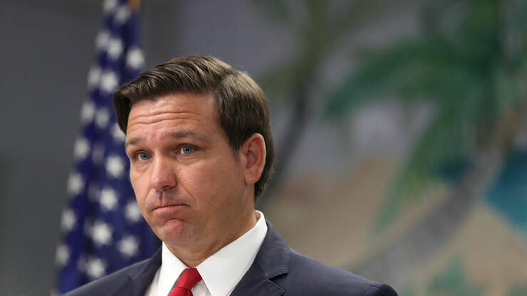 Florida Governor Ron DeSantis Struggles To Put On Face Mask | WiLD 95.5