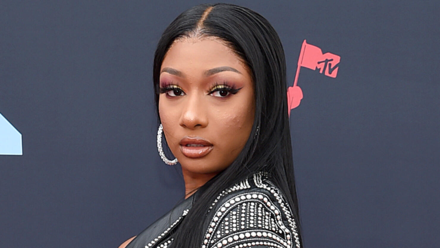 Judge Issues Ruling After Megan Thee Stallion Sues Record Label | iHeart