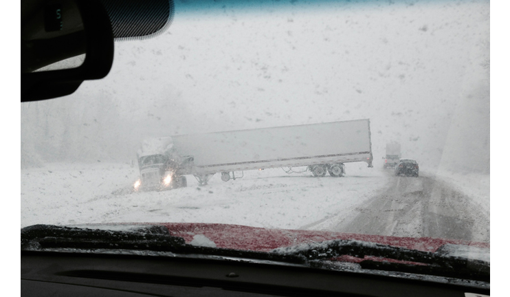 Snow and sleet, semi jackknife