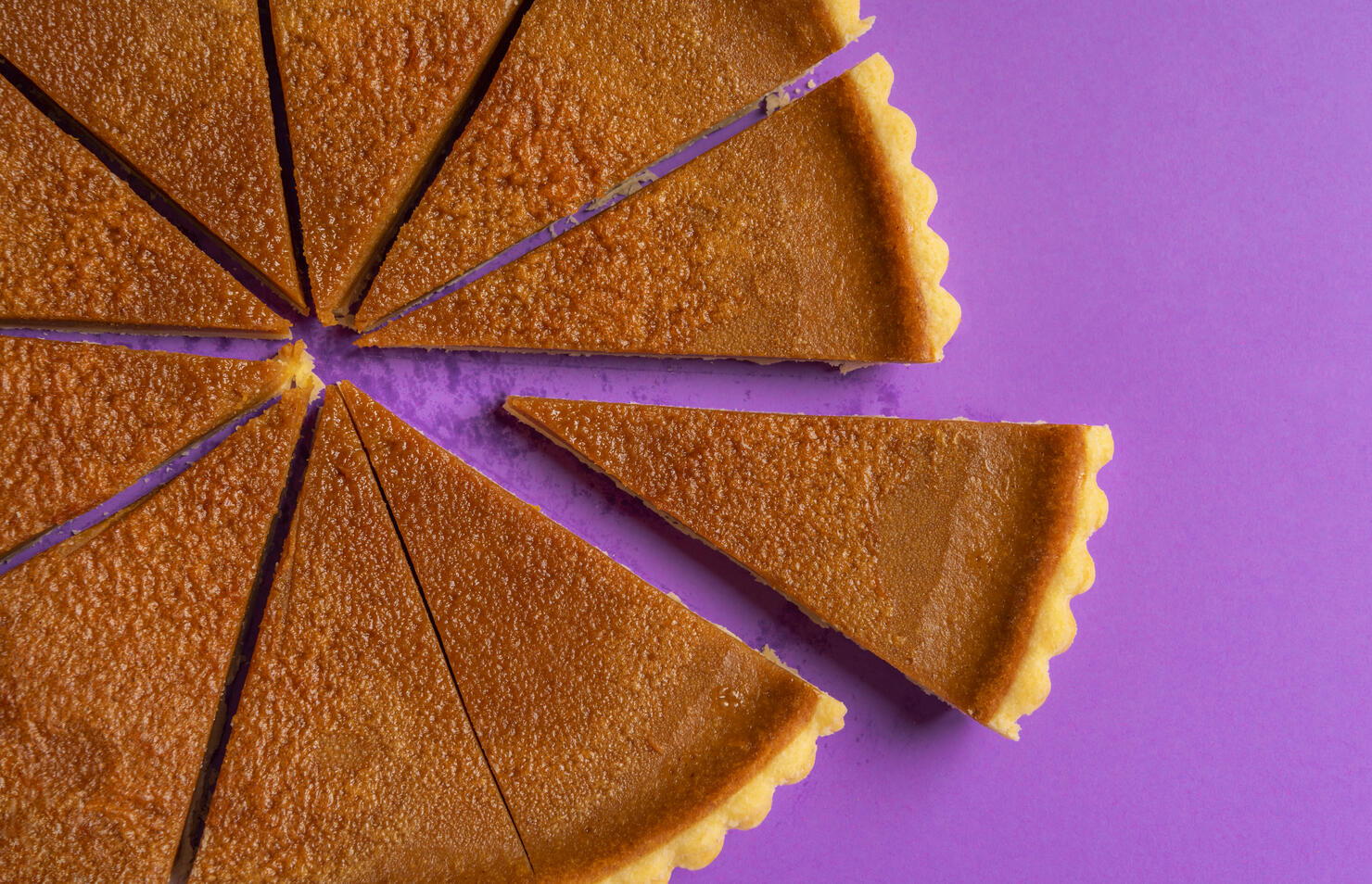 High Angle View Of Cake On Purple Table