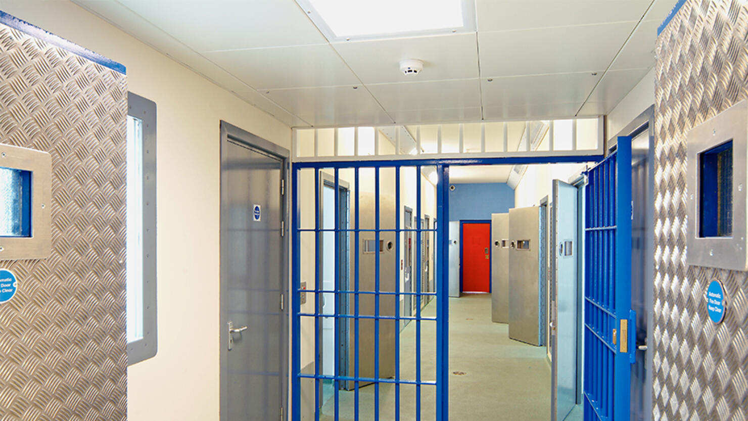 Inside of a modern prison with open doors