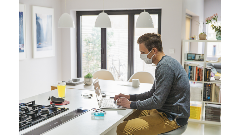 Man in self isolation working from home