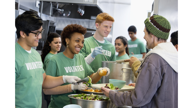 Volunteers working in soup kitchen