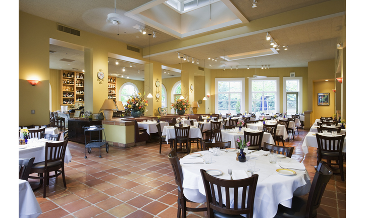 Tables and chairs in empty restaurant