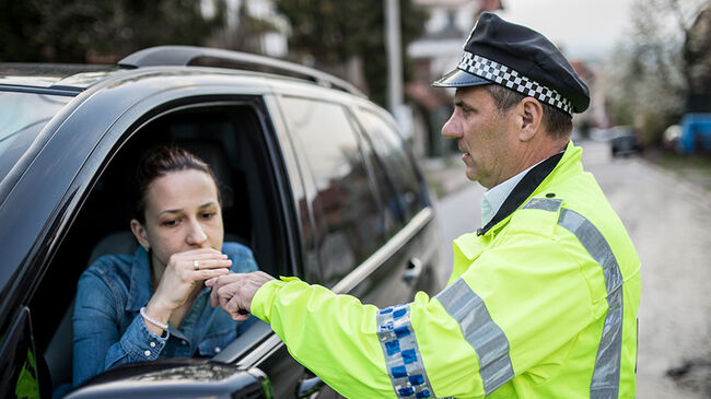 Traffic police officer stopped woman for alcohol test