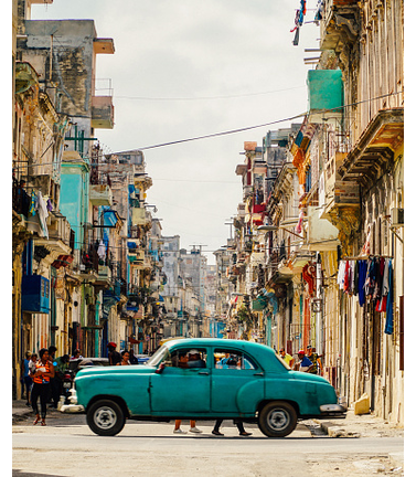 Vintage Car Amidst Buildings