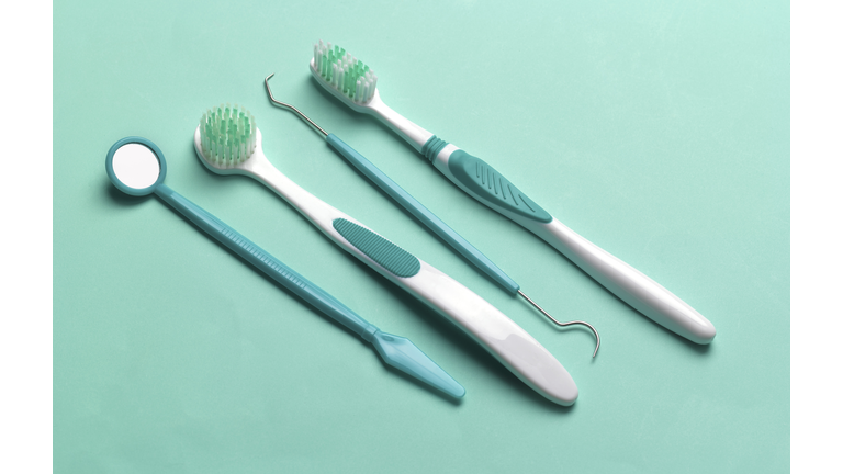 Hygienist's cleaning dental tools. (Getty Images)