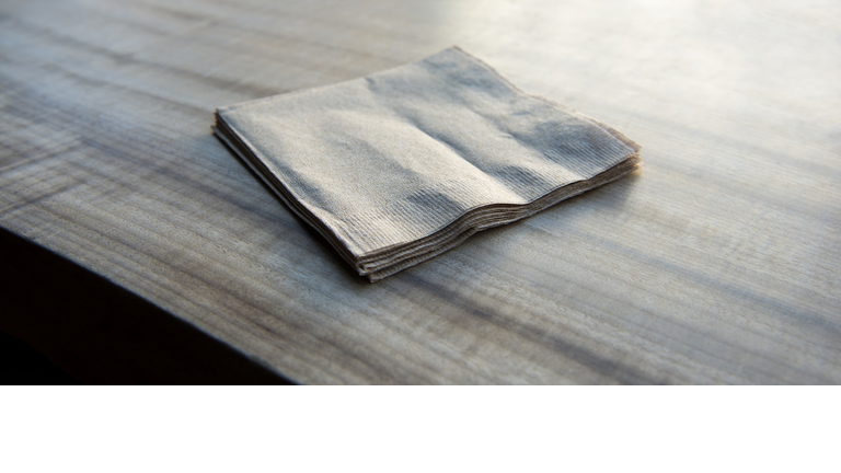 Paper napkins on a wooden table