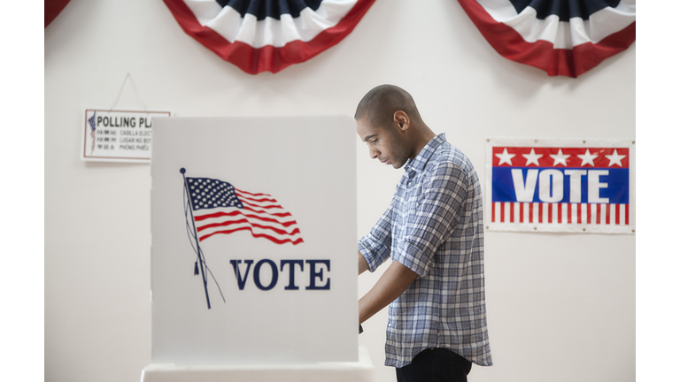 Man voting in polling place