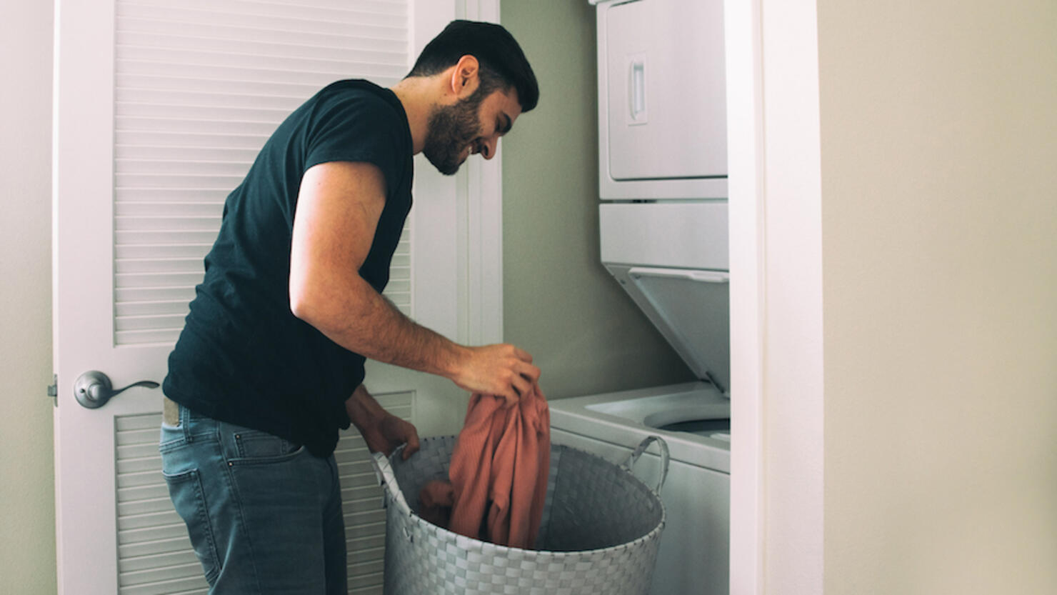 Man doing laundry at home