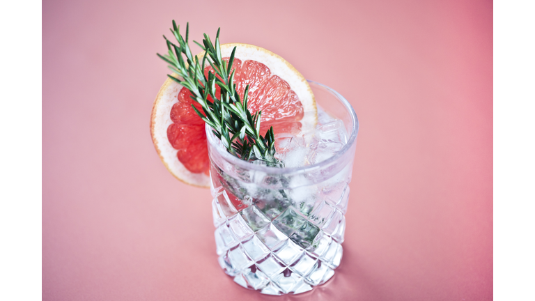 Gin and tonic with a slice of pink grapefruit