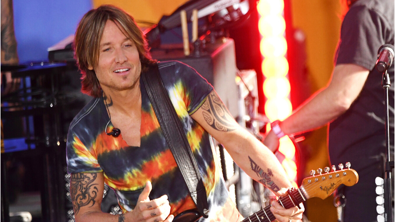 Keith Urban Finds The Light In New 'God Whispered Your Name' Video