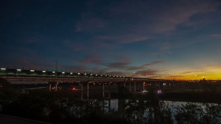  Photo: Vehicles cross the International bridge from Piedras Negras to Eagle Pass